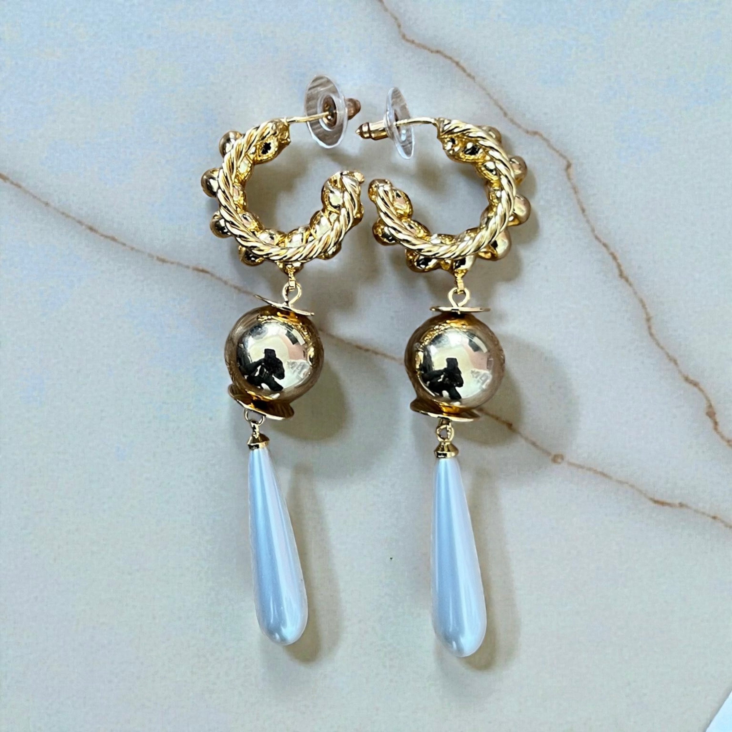 Boucles d'oreilles "ÌMỌ́LẸ̀" en acier inoxydable (actif)